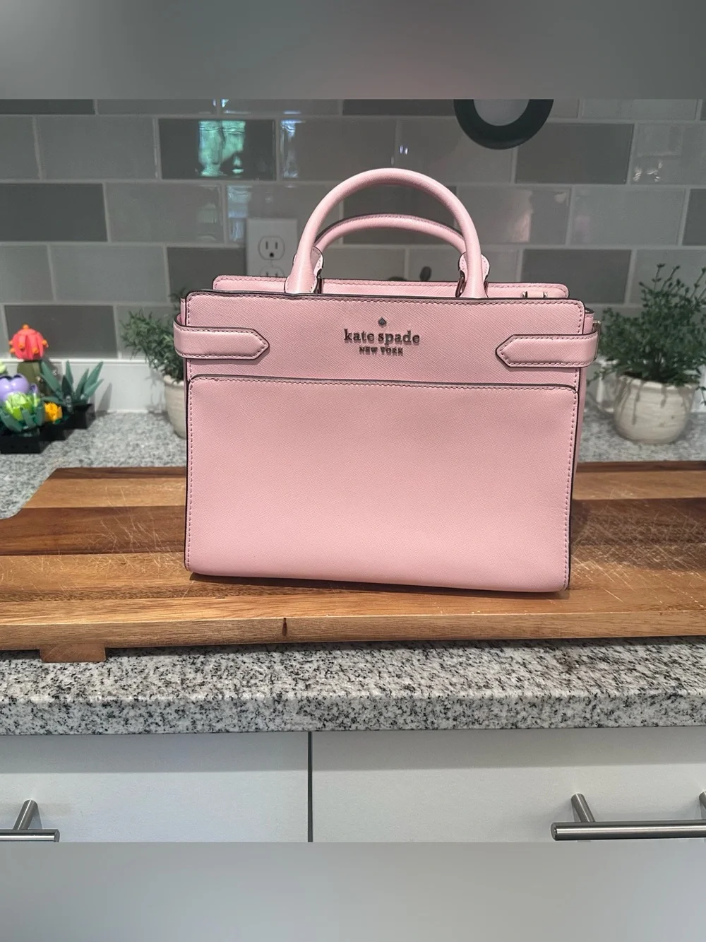 Kate Spade New York structured satchel in a blush pink saffiano leather
